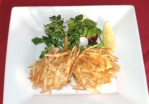 ポテトを着たトンカツ