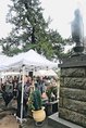地蔵尊像前で開かれた慰霊祭