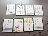 児童が取り合う万葉かるたの下の句の札