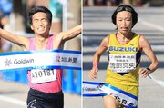 両手を挙げてフィニッシュテープを切る佐藤(左)と清田(右)=富山市湊入船町