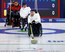 事故越え、測量士と競技を両立