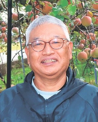 カラフル<br />国吉りんご農園スタッフ・柴義弘さん